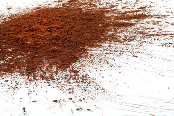 Sprinkled cocoa powder on wood table