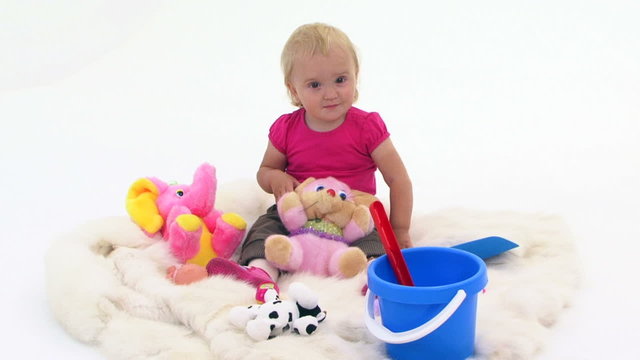 Baby Girl With Toys On White Cover