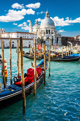 Grand Canal in Venice, Italy, with colorful gondola boats © VOJTa Herout