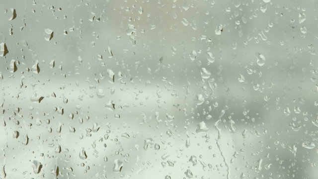 Snow and rain on the window