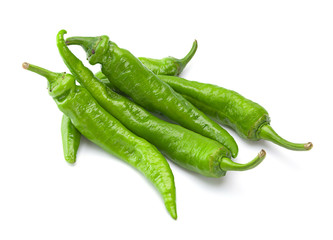 Green chilli pepper on white
