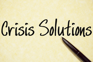 crisis solutions text write on paper