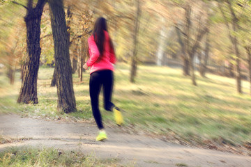 Young woman jogging at park