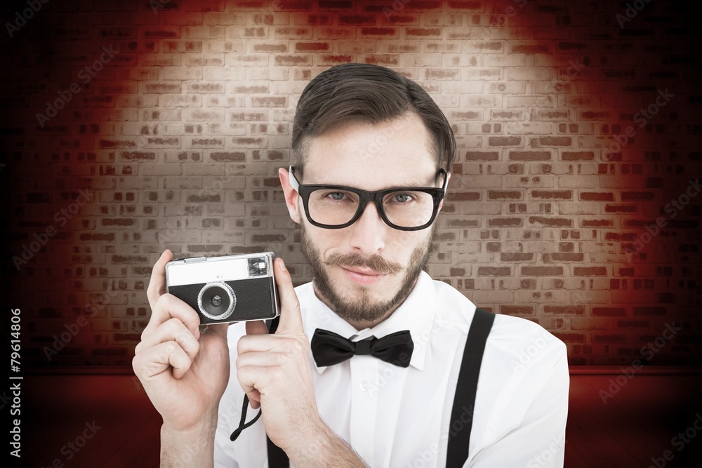 Aufkleber composite image of geeky hipster holding a retro camera