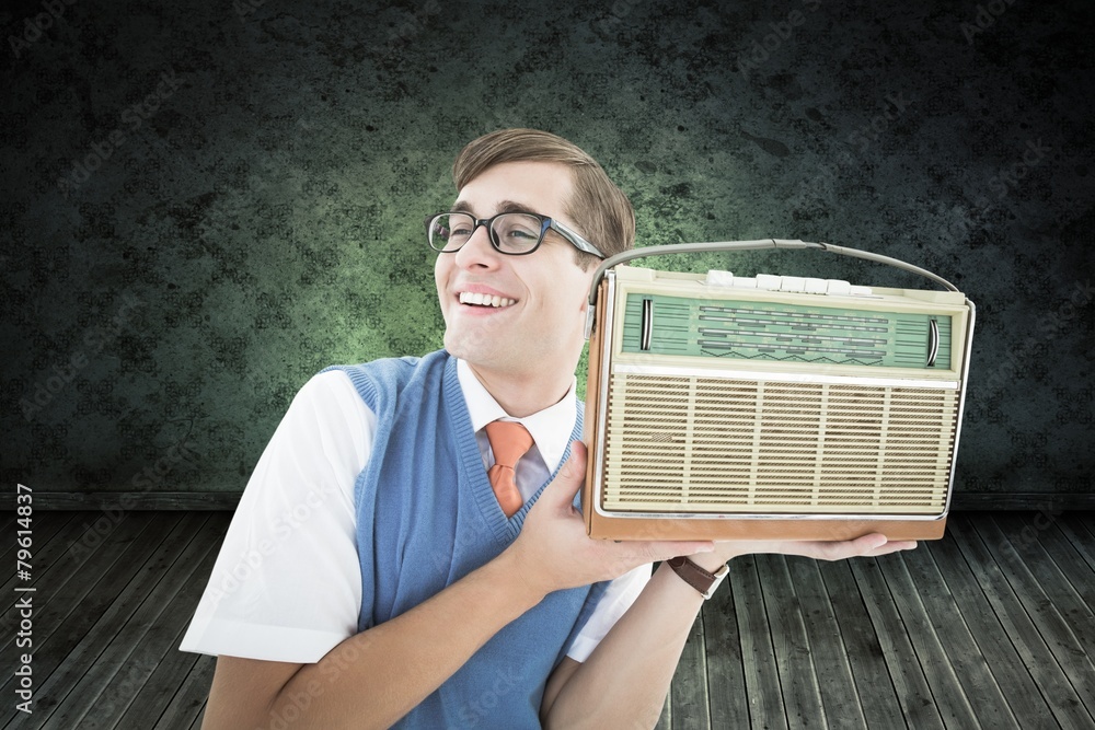 Poster Composite image of geeky hipster listening to retro radio