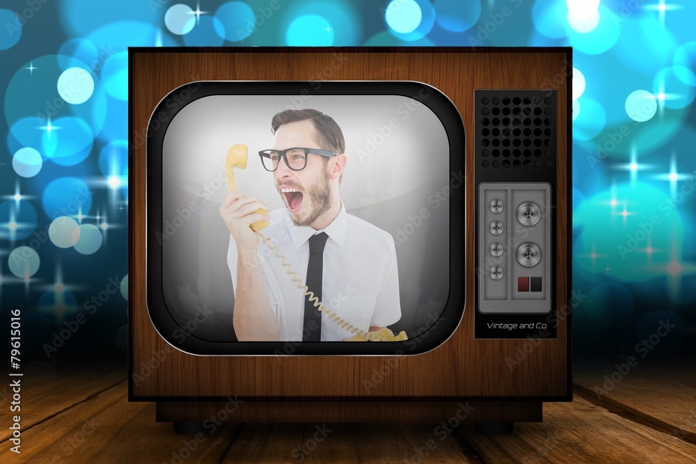 Aufkleber composite image of geeky businessman shouting at telephone