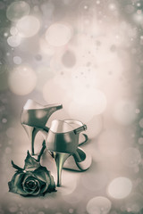 Abstract  background with tango shoes and a rose