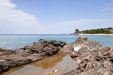 sea and volcanic rocky shore