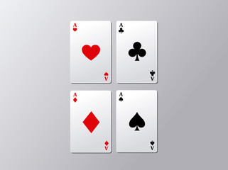 Playing poker cards. Poker aces flying isolated on gray