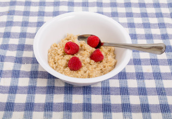 Oatmeal with Raspberries and Spoon