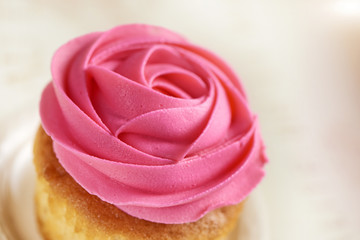 cupcake with pink rose closeup