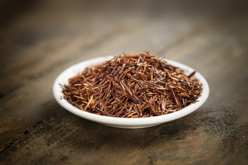 rooibos tea on a small white plate