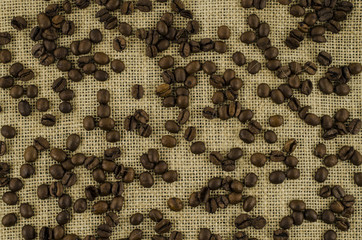 Coffee beans on linen background