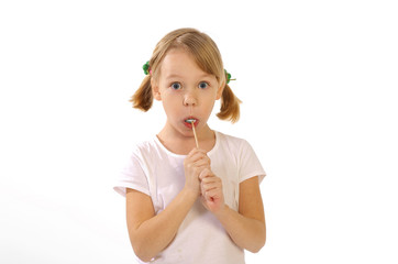 girl with lollipop on a white background © wip-studio