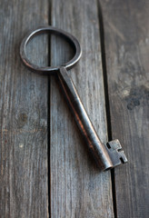 big key on wooden rustic table