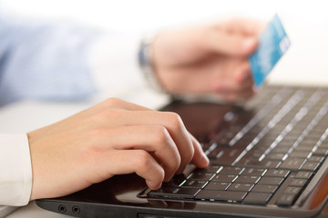 Man working on laptop in office