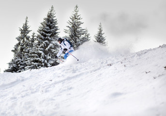 Fototapeta na wymiar Man skiing