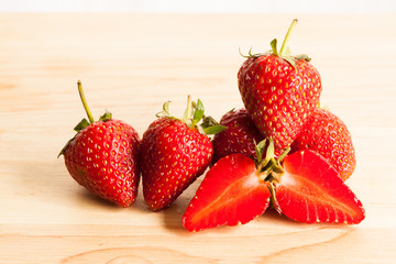 Fresh strawberry on wood.