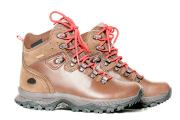 pair of leather hiking boots isolated on white side view
