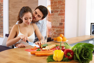 Couple Cooking Food in Kitchen. Healthy lifestyle