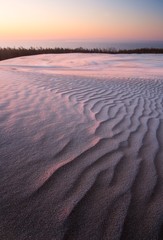 Sand dunes at sunrise