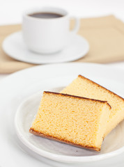 Close - up Sponge cake on white ceramic plate