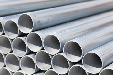Close - up Stack of construction metal pipes