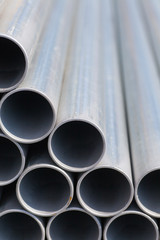 Close - up Stack of construction metal pipes