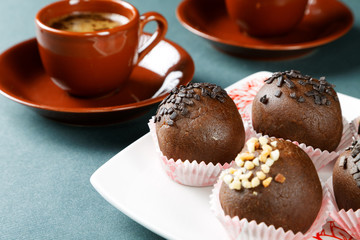 Still-life with a cup of coffee and cakes
