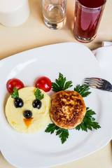 Restourant serving dish for child`s menu - potato puree, cutlet