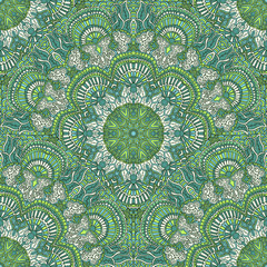 Seamless patterned background in ethnic style.