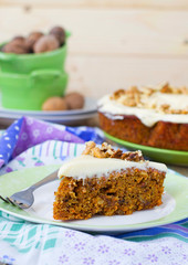 carrot cake with walnuts and cream