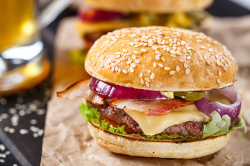 Delicious burger on wooden board