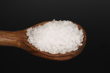 Salt in a wooden spoon