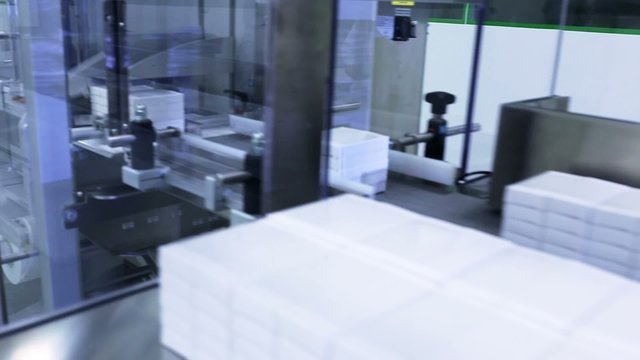Automatic pills packing machine at a pharmaceutical factory