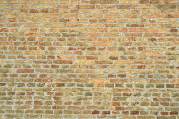 old bricks stone wall in various colors