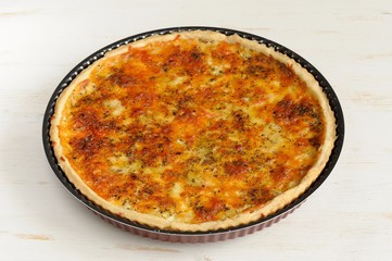 Round cheese tart on white background