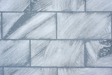 Laying ceramic tiles