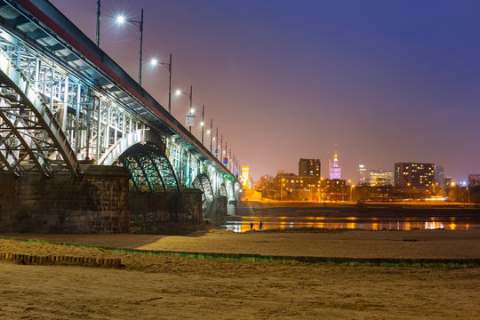 Fototapeta Architecture of Poniatowski bridge over Vistula river in Warsaw