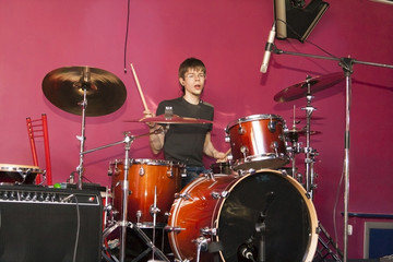 man playing on drum