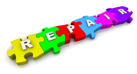 Rrepair. Inscription on the multicolored puzzles