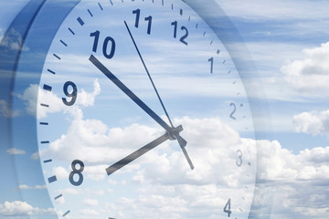 Time passing clock in sky