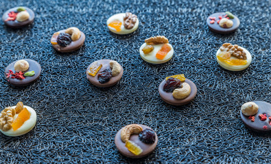 Swiss chocolate candies with nuts and dried fruits