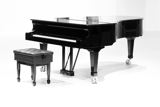 grand piano on white background