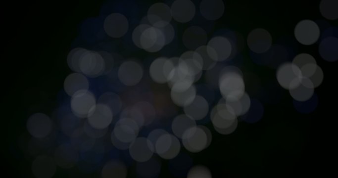 Blurred fairy lights from fireworks background.