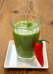 Green spinach smoothie and sweet red peppers