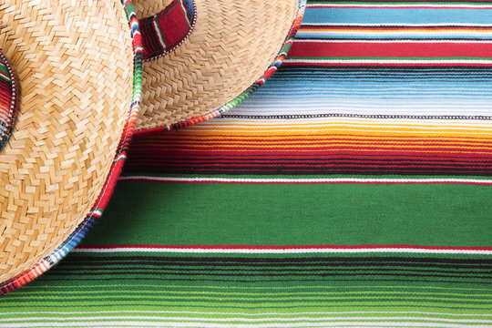 Mexican blanket or rug and sombrero Mexico holiday vacation cinco de mayo fiesta background photo