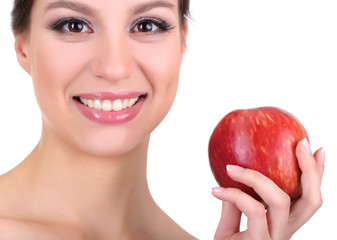 Smiling woman with apple isolated on white