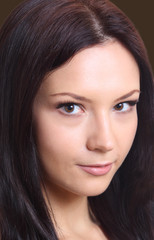 Fototapeta premium Beautiful brunette girl of twenty