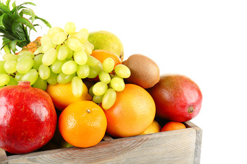 Assortment of fruits in box isolated on white